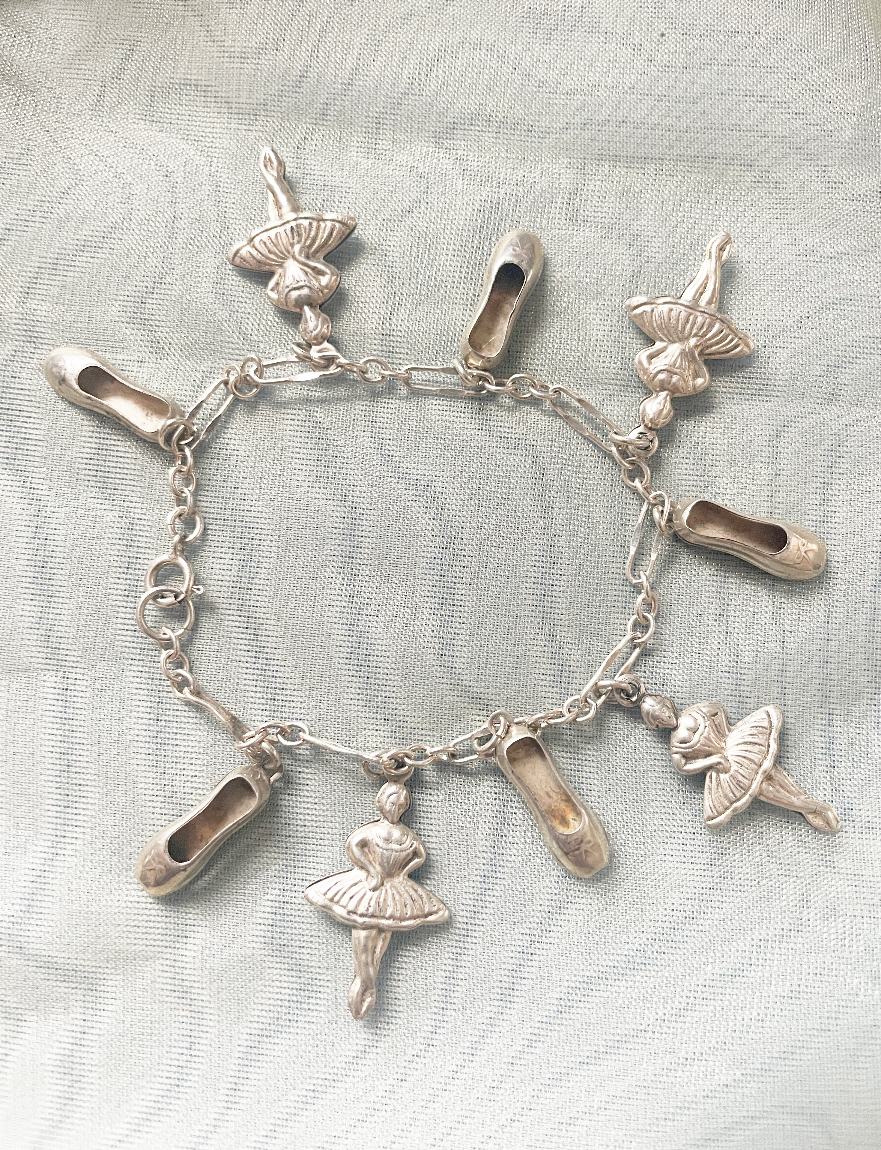 Vintage sterling silver charm bracelet. store