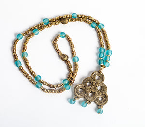 Berber Spiral Brass Pendant with Turquoise Recycled Glass beaded Long Necklace